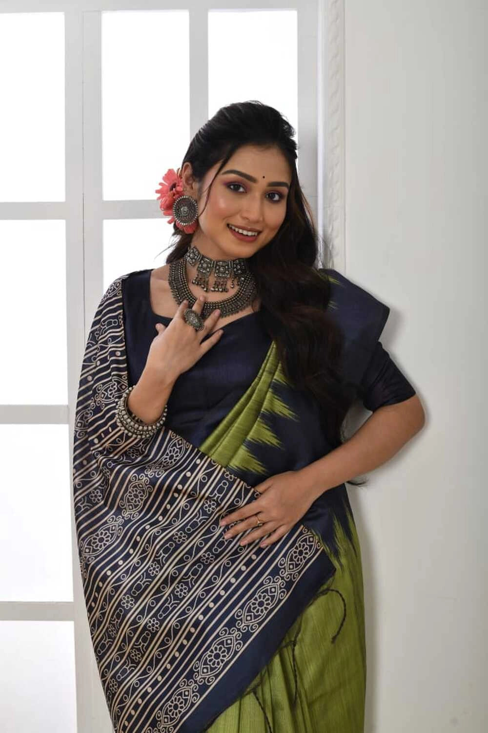 Parrot green color tussar silk saree with printed work