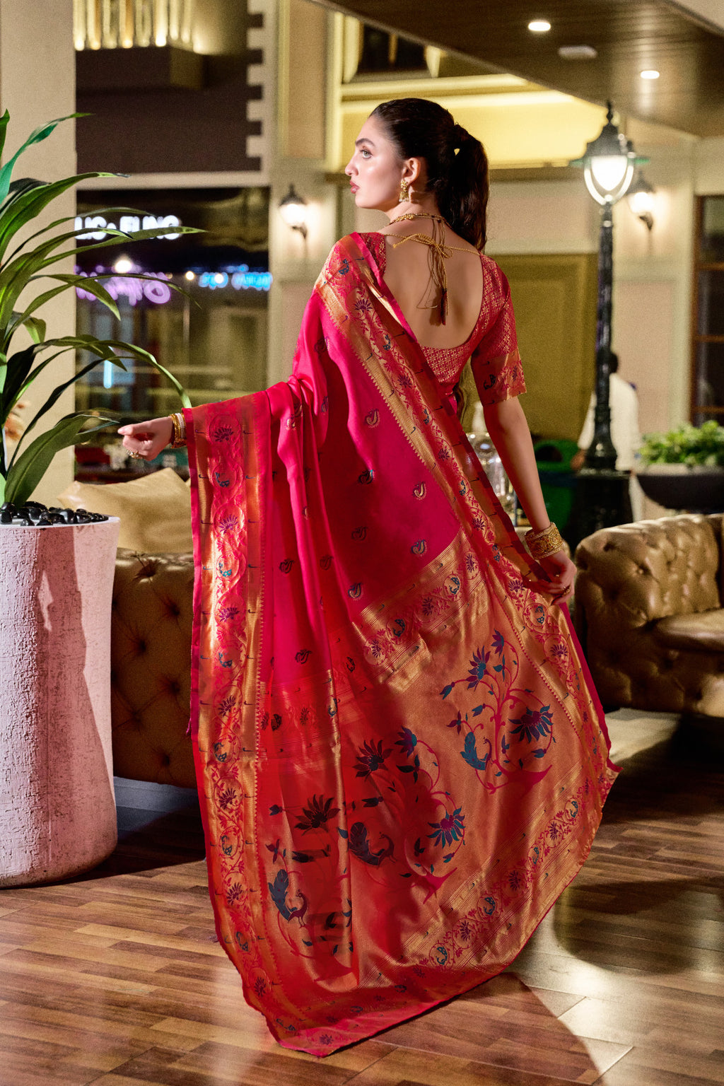 Traditional pink paithani silk saree with zari weaving work