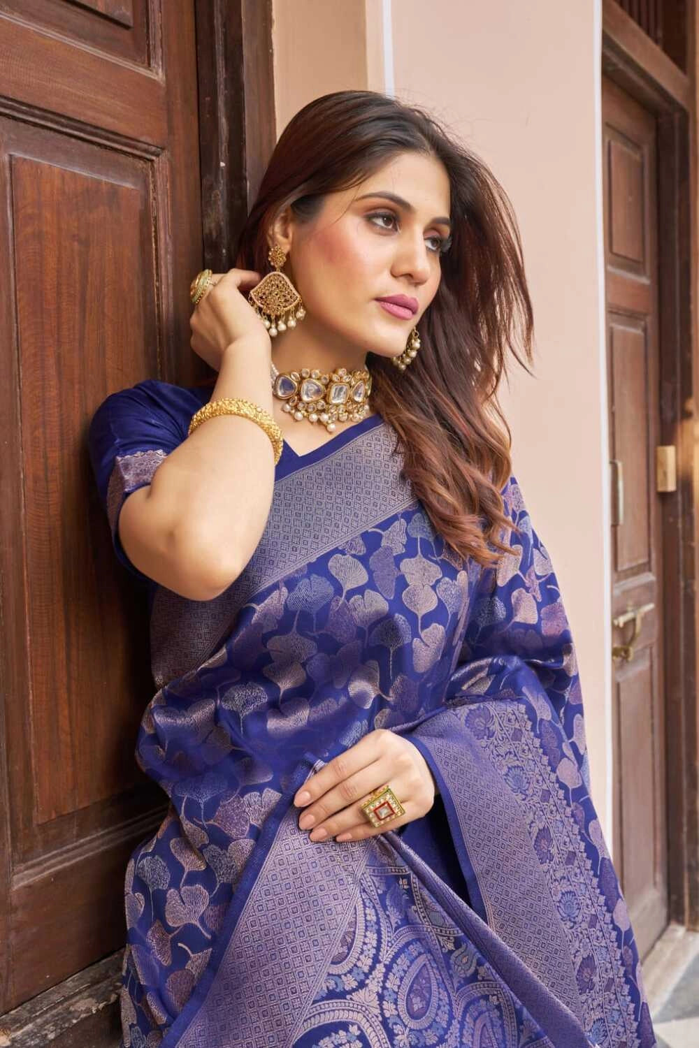 Navy blue color kanjivaram silk saree with zari weaving work