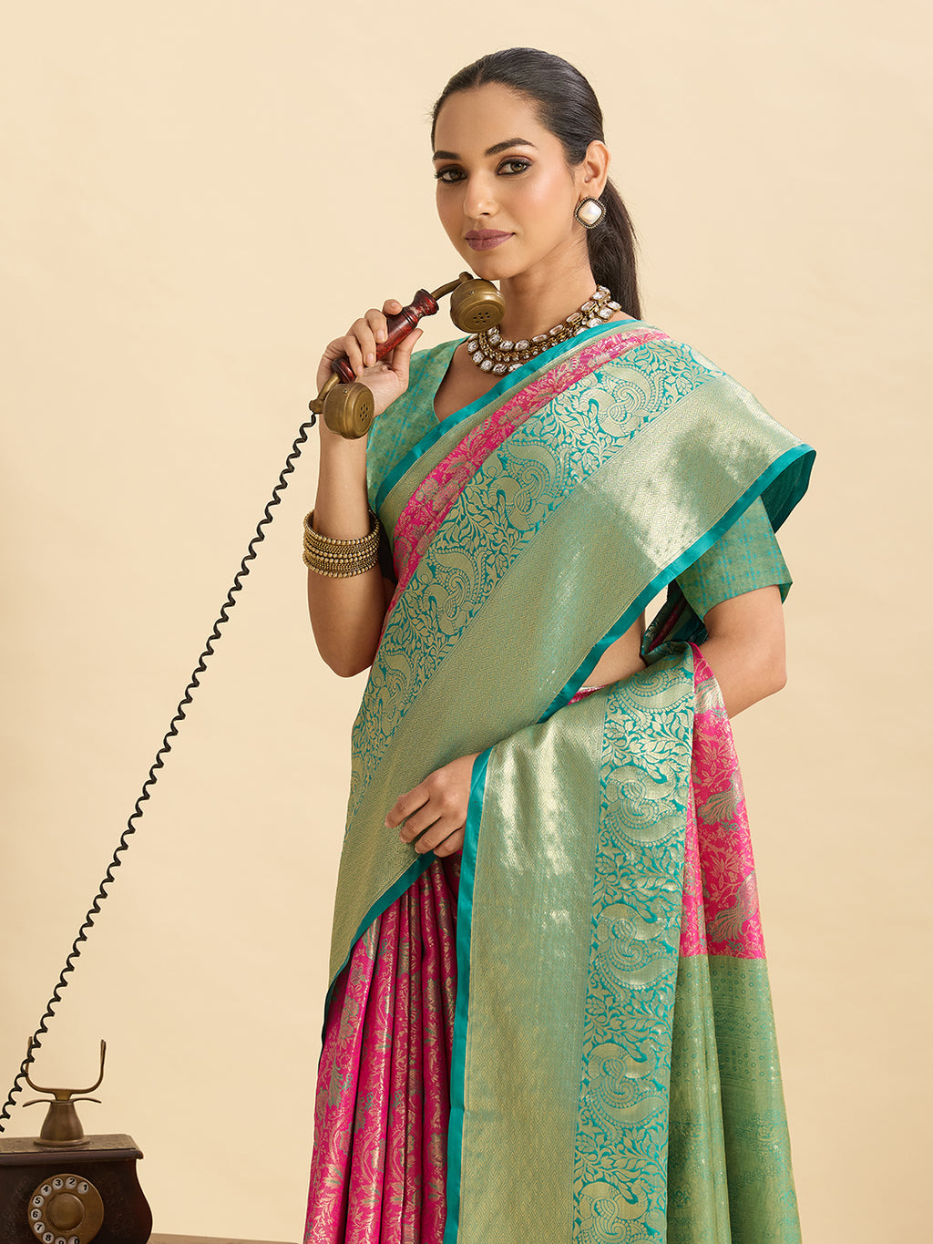 Pink kanjivaram silk saree with zari weaving work and big border
