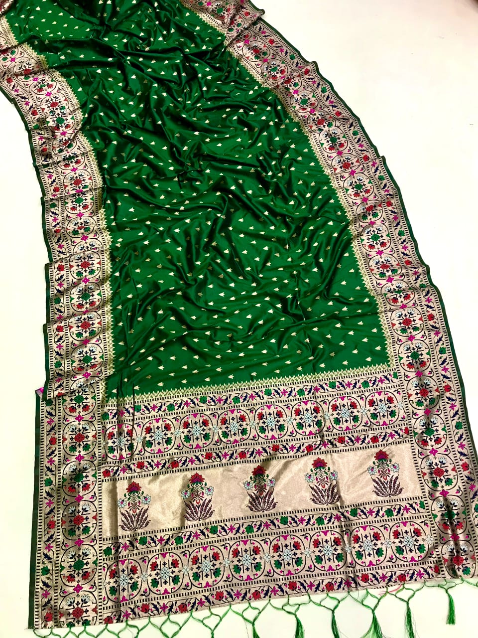 Green color paithani silk saree with zari weaving work