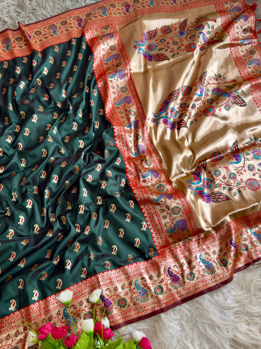 Green traditional paithani silk saree with peacock zari weaving work