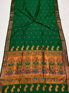 Green color paithani silk saree with zari weaving work