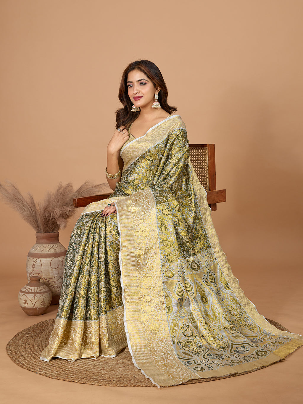 Mahendi green kanjivaram silk saree with zari weaving work