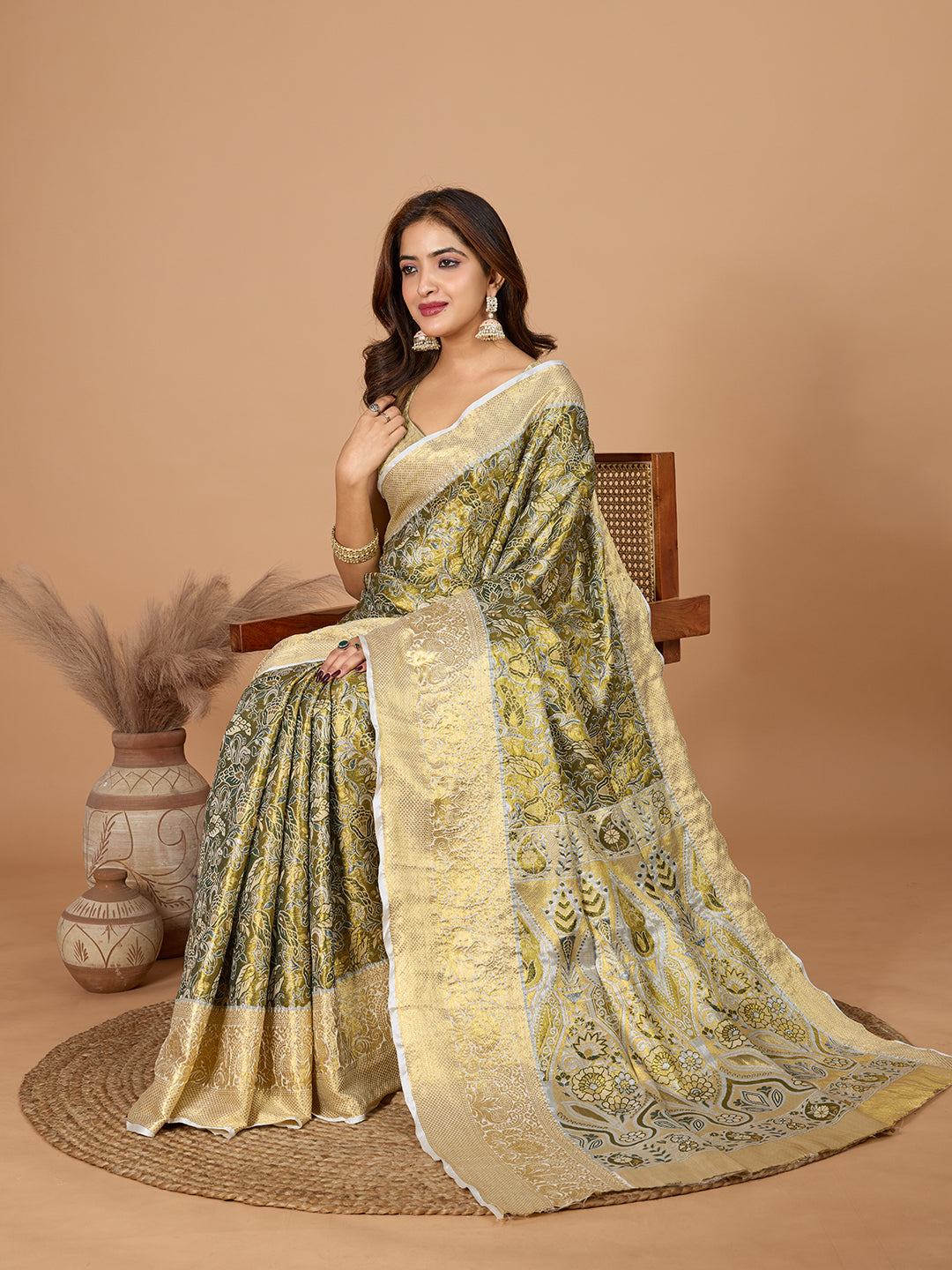 Mahendi green kanjivaram silk saree with zari weaving work