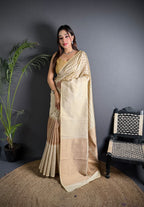 Off white color banarasi silk saree with zari weaving work