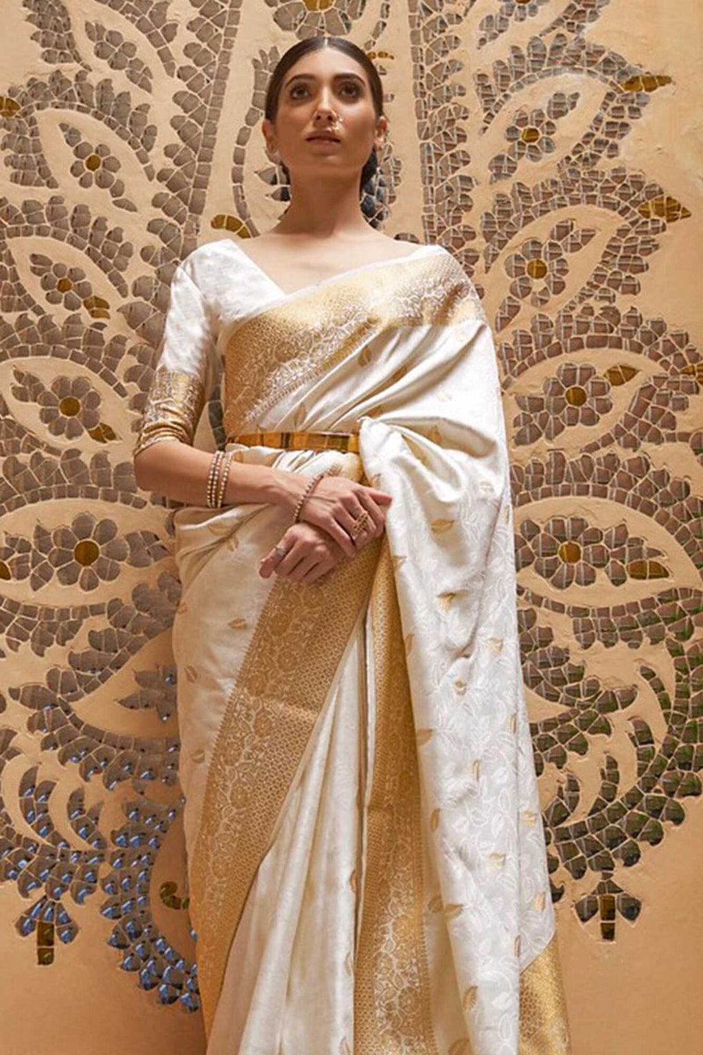 Off white soft banarasi silk saree with zari weaving work