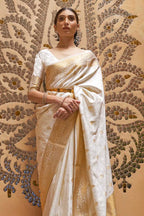 Off white soft banarasi silk saree with zari weaving work