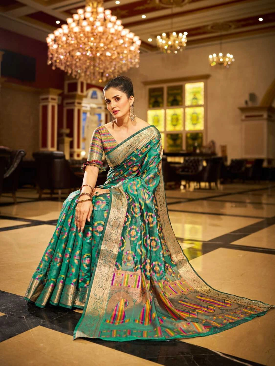 Rama green soft organza silk saree with zari weaving work