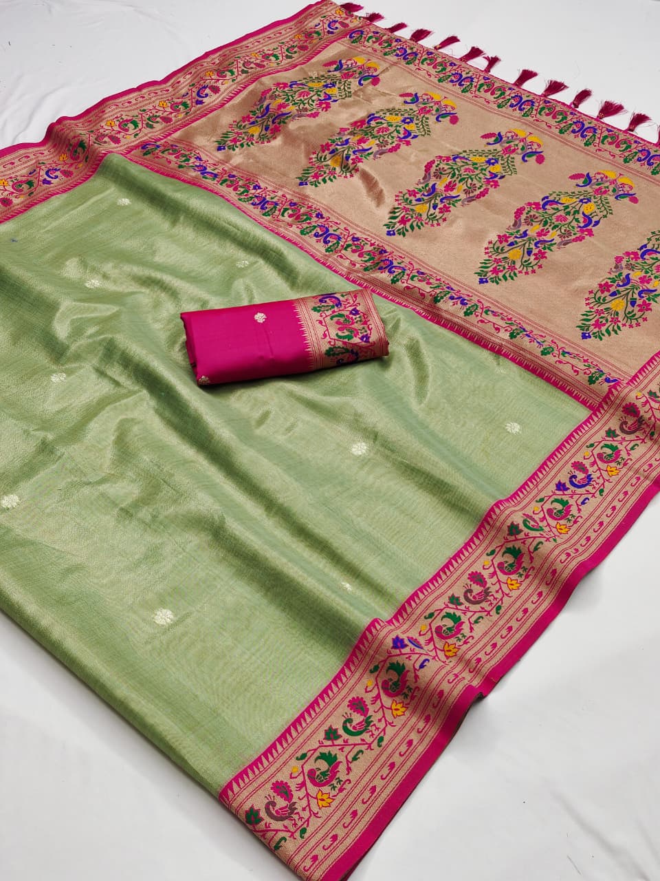 Green soft tissue paithani silk saree with zari weaving work