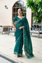 Dark green fancy shimmer chiffon saree with embroidery work
