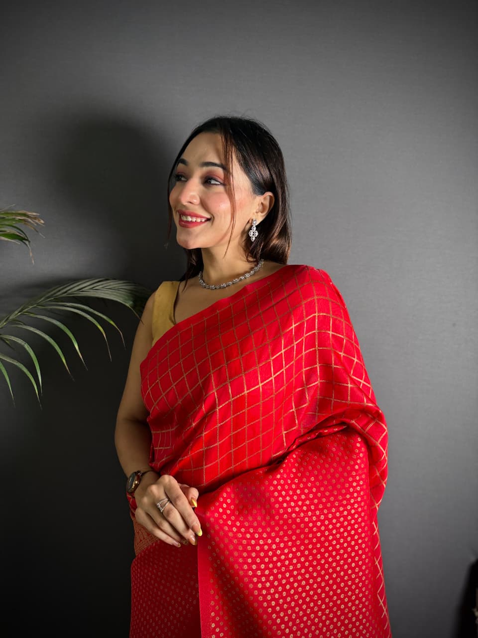 Red color banarasi silk saree with zari weaving work