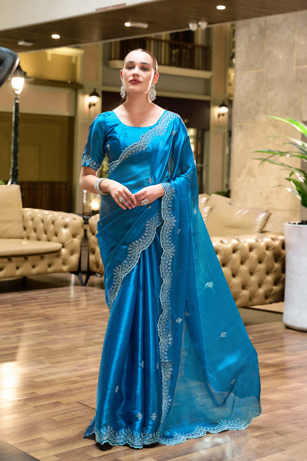 Blue fancy shimmer chiffon saree with embroidery work