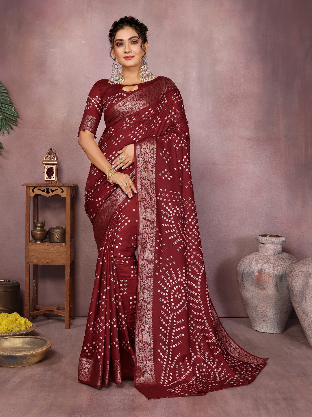 Maroon colour hand bandhej bandhani saree with zari weaving work