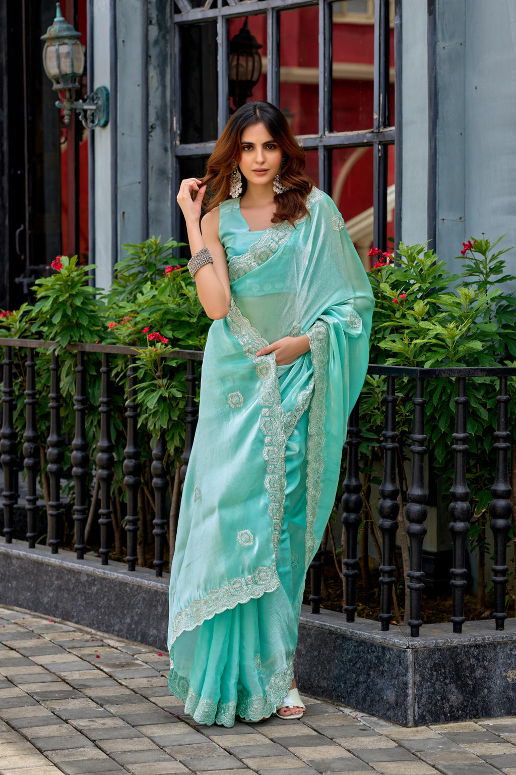 Sea green fancy shimmer chiffon saree with embroidery work