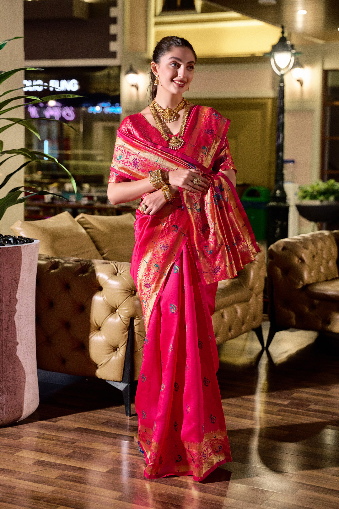 Traditional pink paithani silk saree with zari weaving work