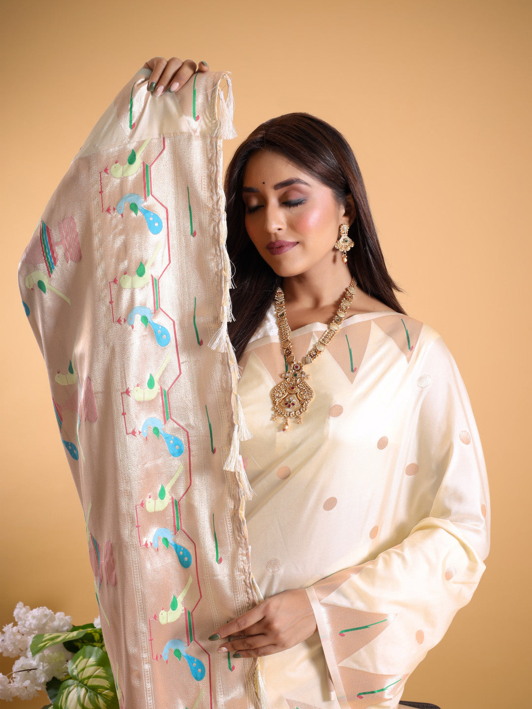 Off white color paithani silk saree with zari weaving work