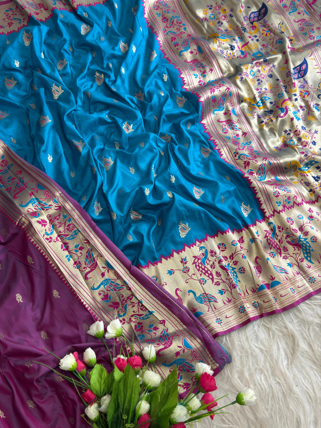 Sky blue traditional paithani silk saree with peacock zari weaving work