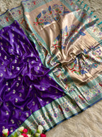 Purple traditional paithani silk saree with peacock zari weaving work