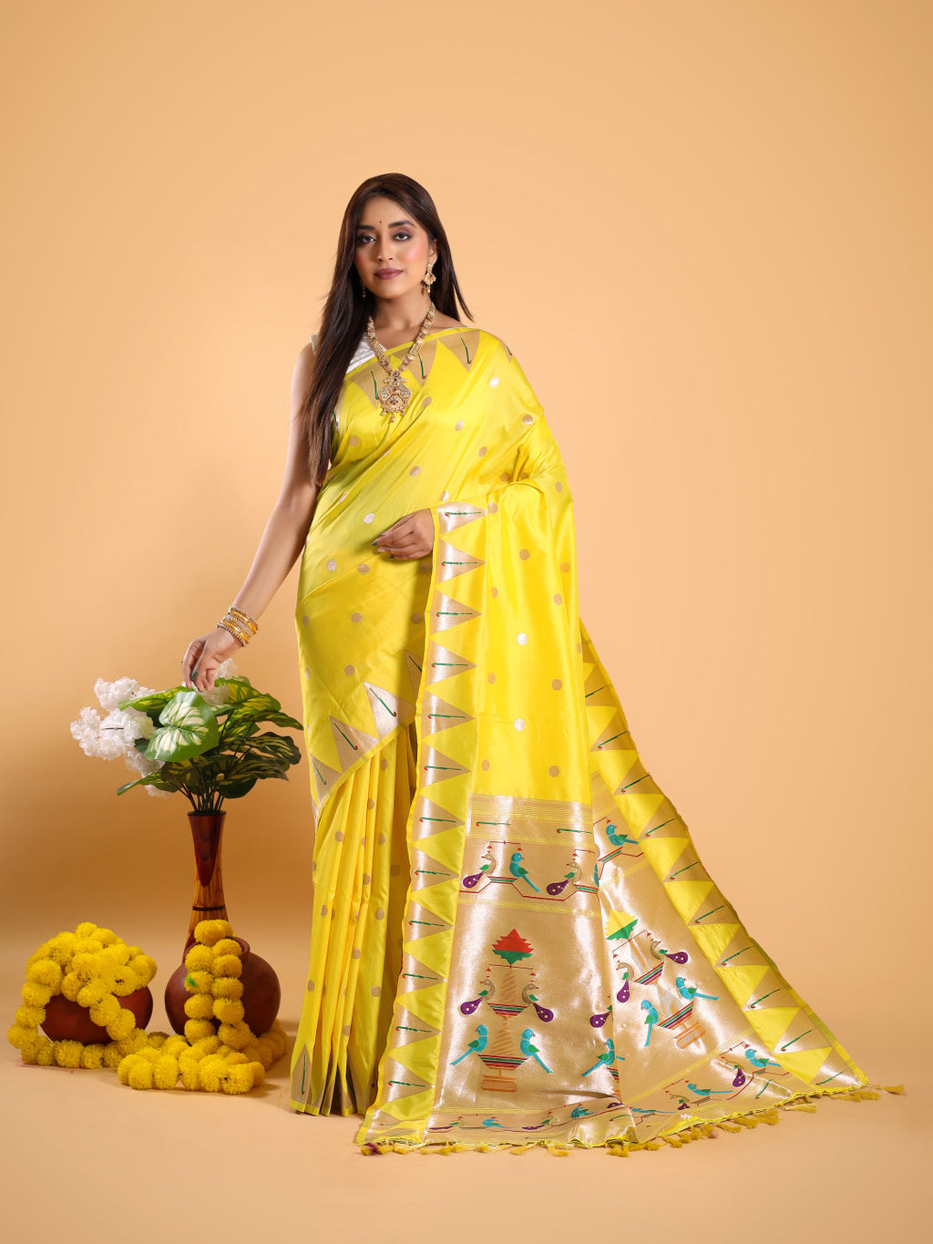Yellow color paithani silk saree with zari weaving work