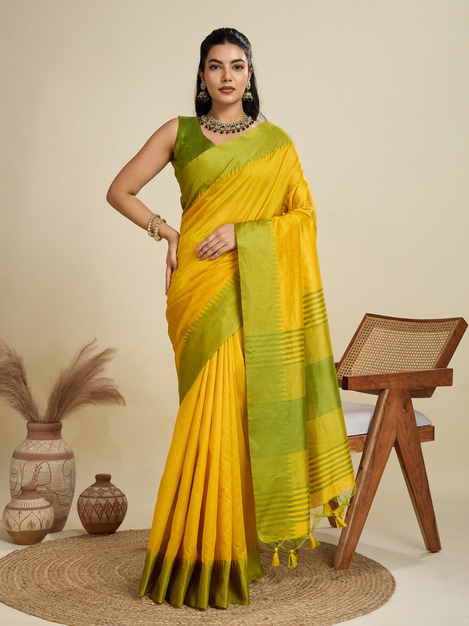 Yellow color khadi raw silk saree with zari lining pallu with tample border