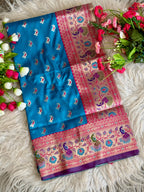 Sky blue traditional paithani silk saree with peacock zari weaving work