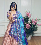 Peach and blue color dola silk lehenga with foil and patola printed work