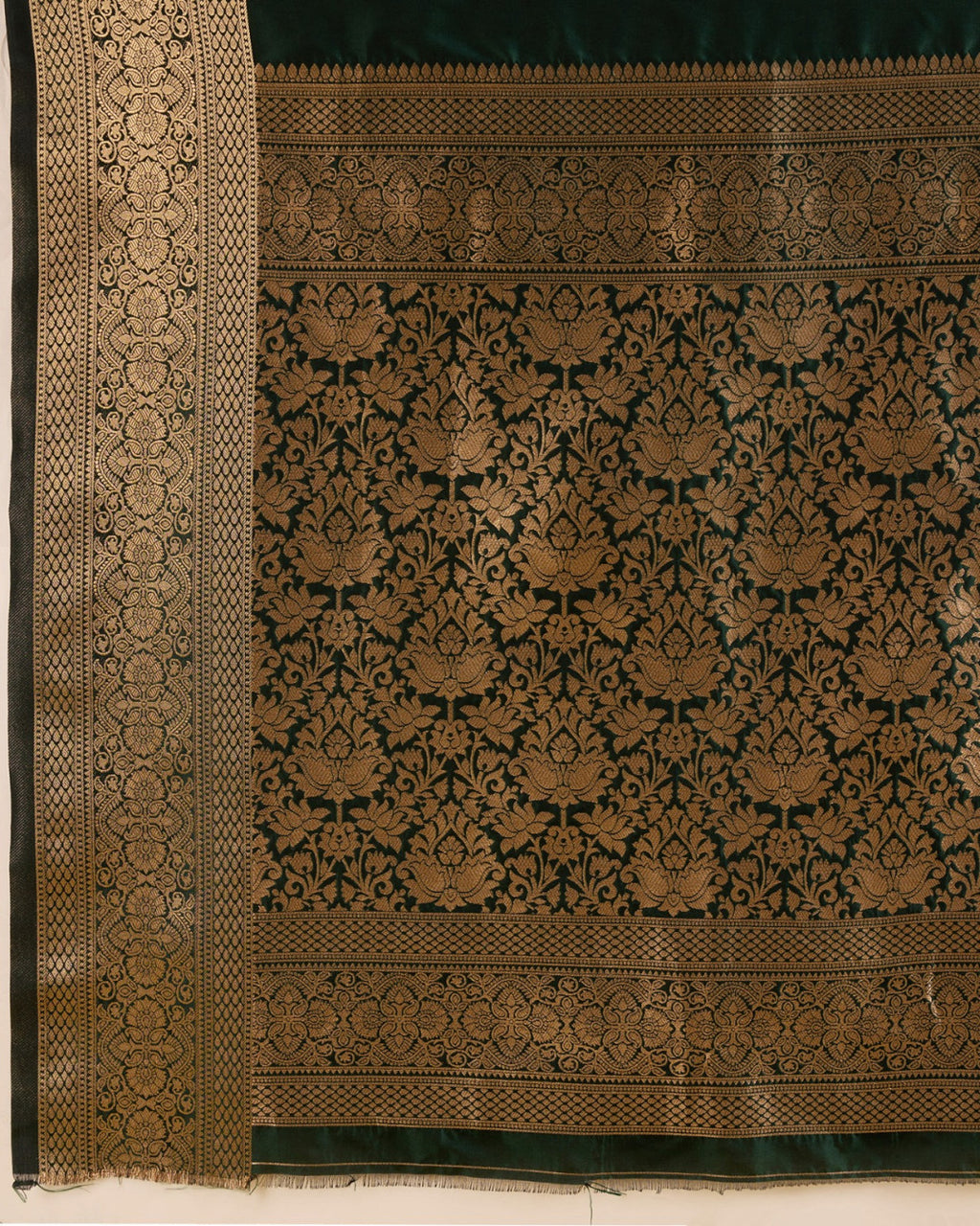 Dark green color soft kanchipuram silk saree with zari weaving work