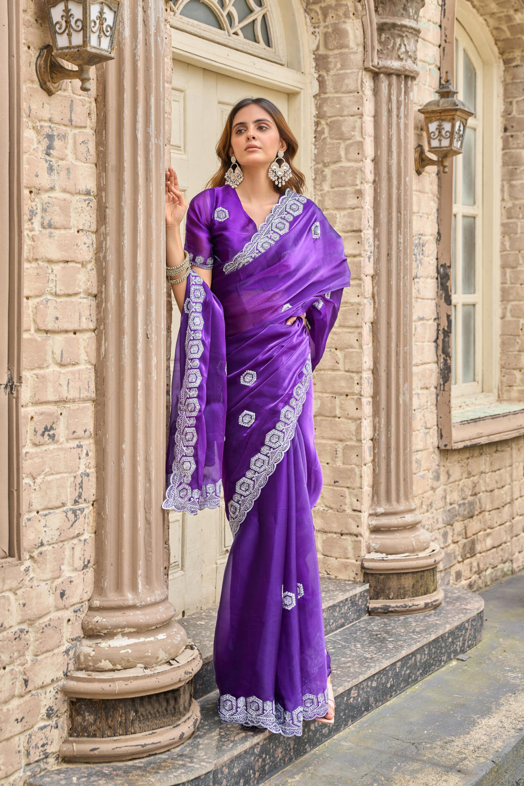 Purple fancy shimmer chiffon saree with embroidery work