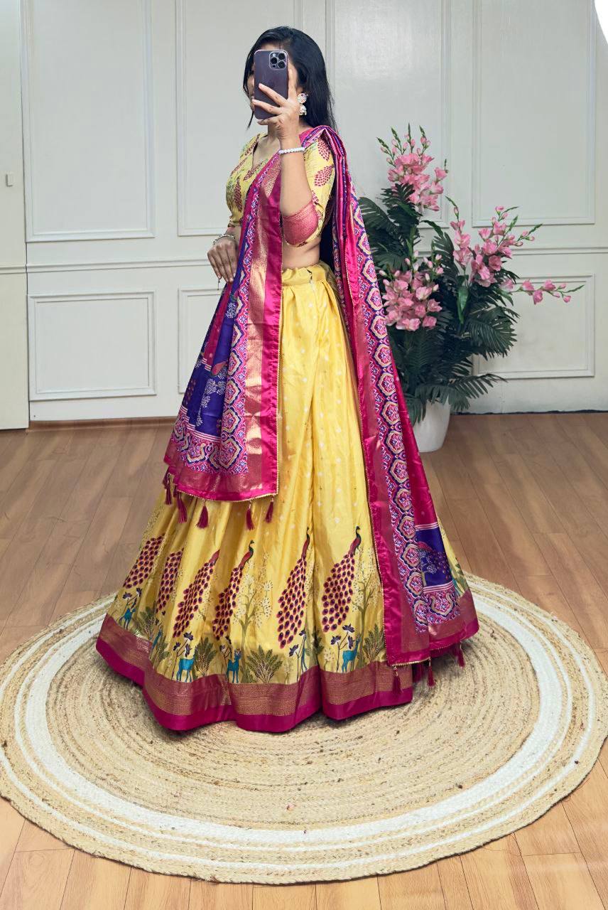Yellow and pink color dola silk lehenga with foil and patola printed work