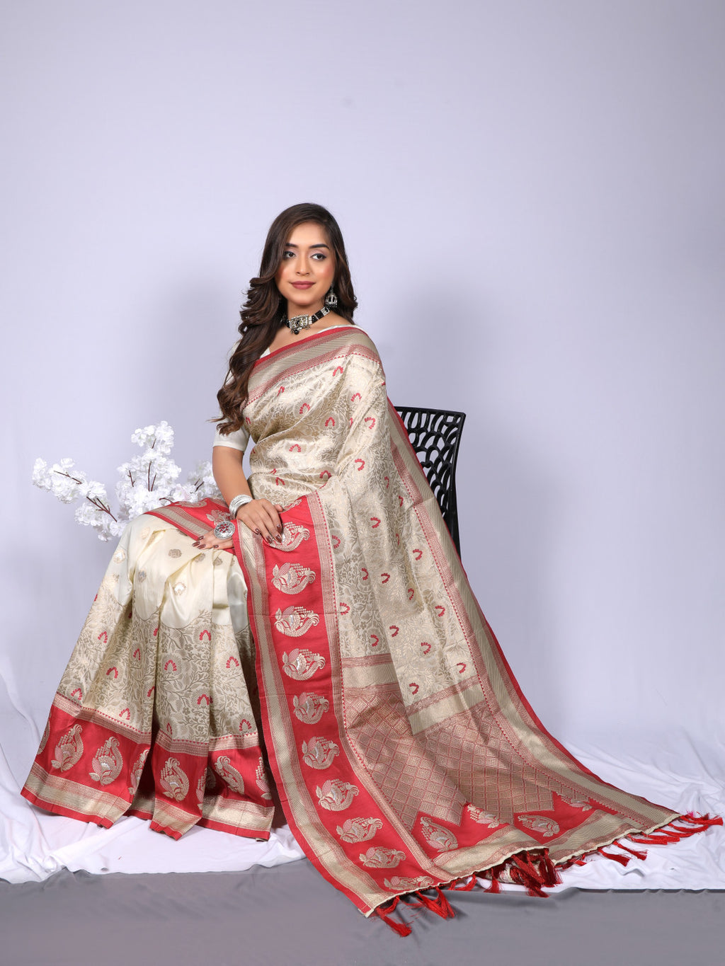 Off white color kanchipuram silk saree with zari weaving work