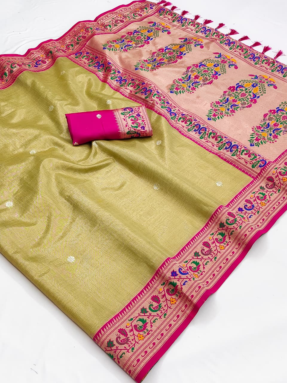 Pista green soft tissue paithani silk saree with zari weaving work