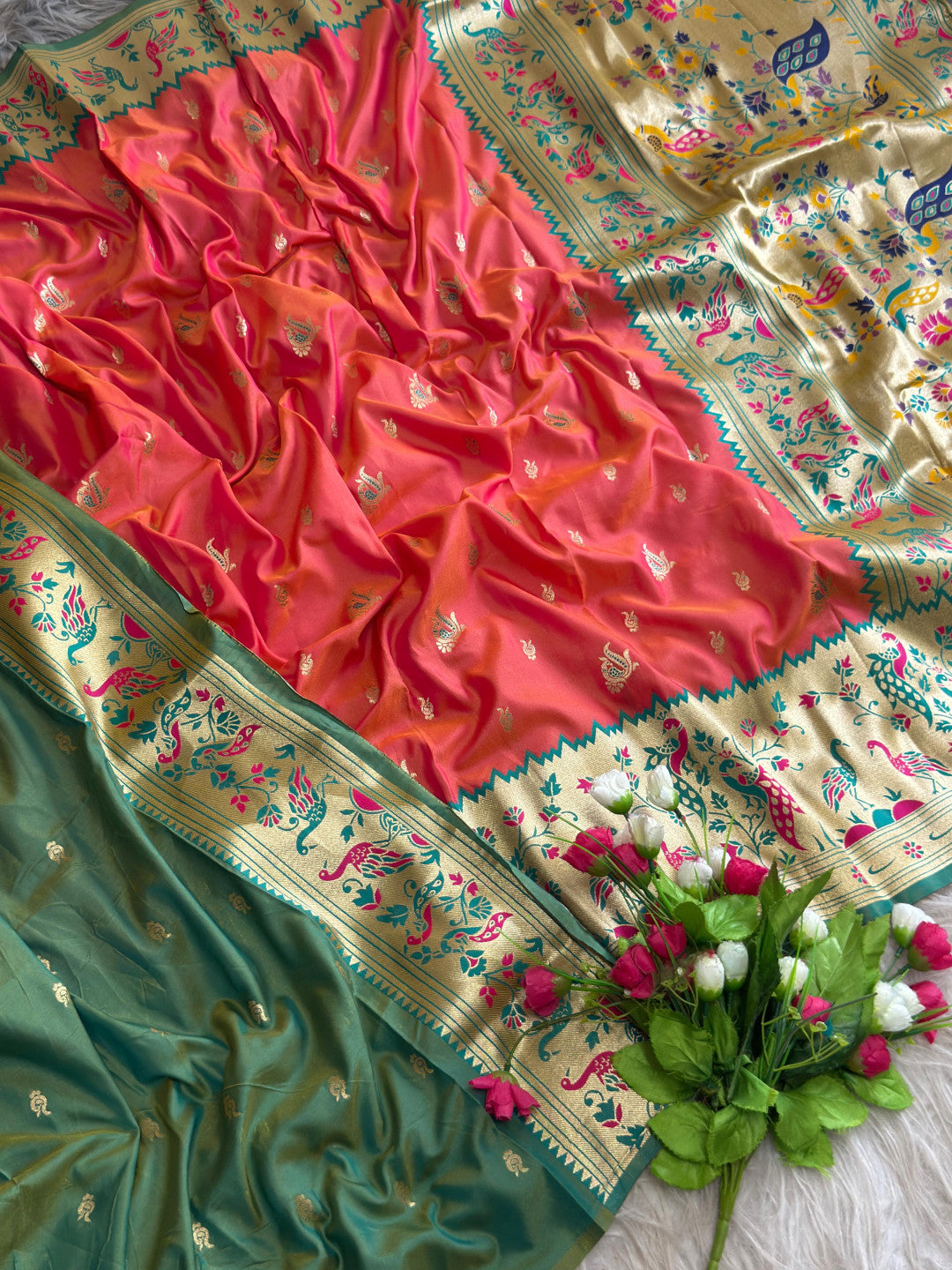 Orange traditional paithani silk saree with peacock zari weaving work