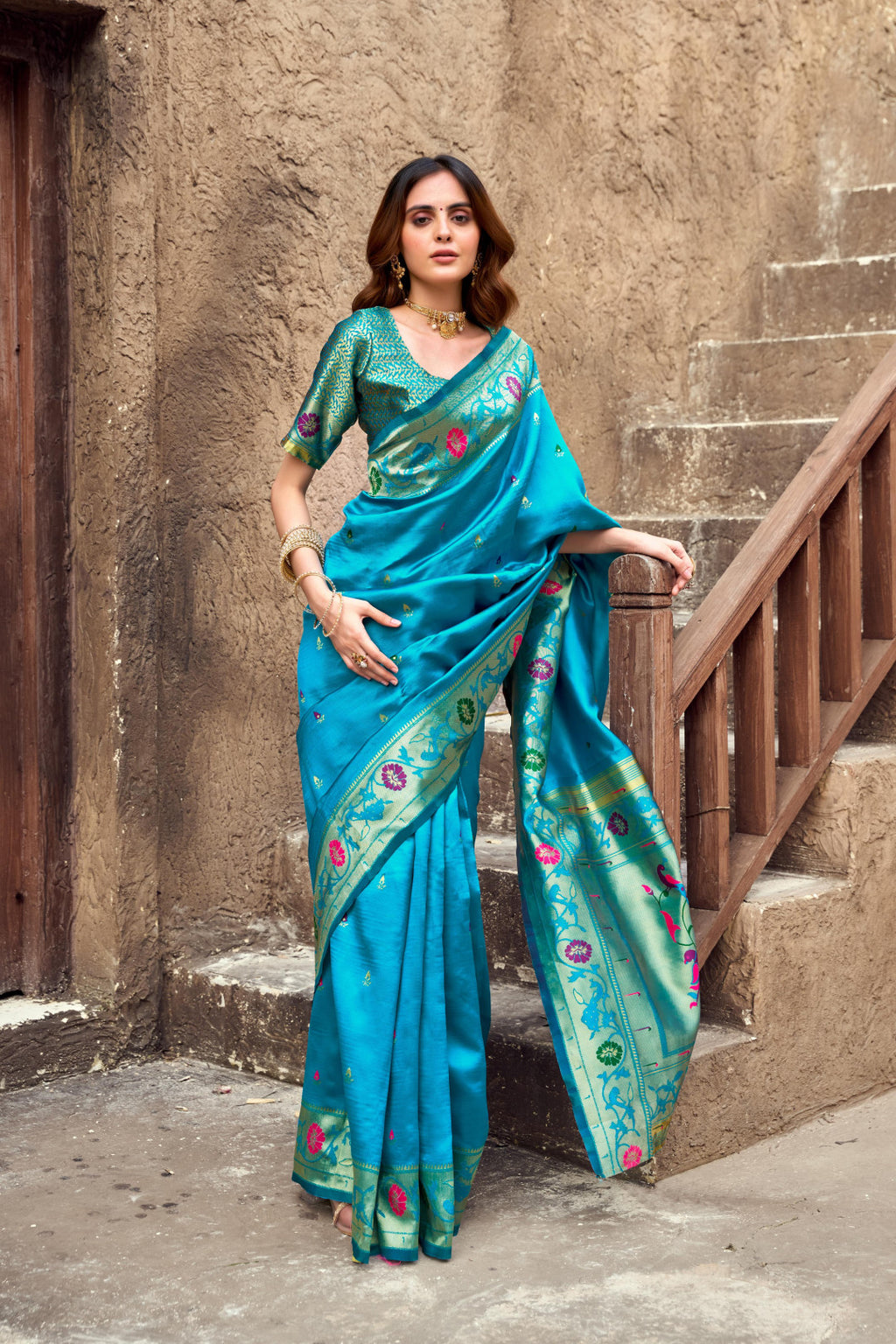 Traditional blue paithani silk saree with zari weaving work
