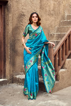 Traditional blue paithani silk saree with zari weaving work