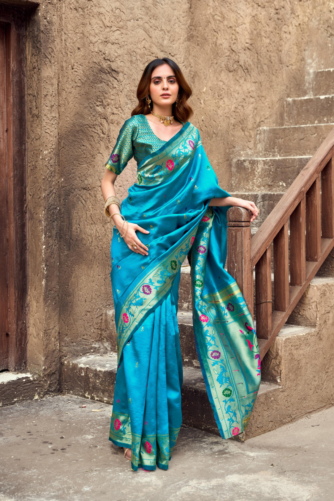 Traditional blue paithani silk saree with zari weaving work