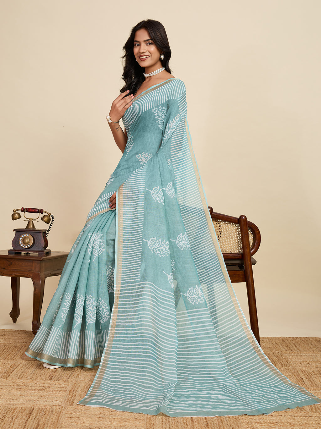 Sea green linen cotton saree with digital printed work and silver zari border