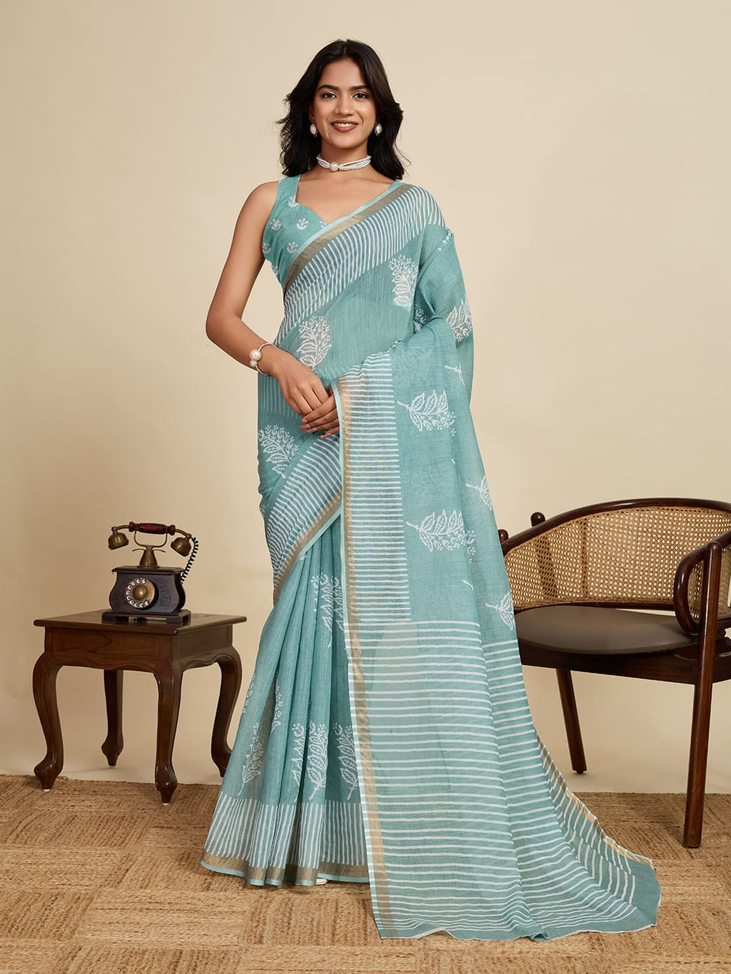 Sea green linen cotton saree with digital printed work and silver zari border