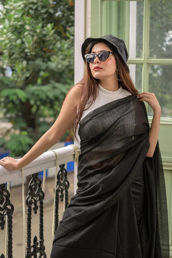 Black plain khadi cotton saree with fancy tassel work