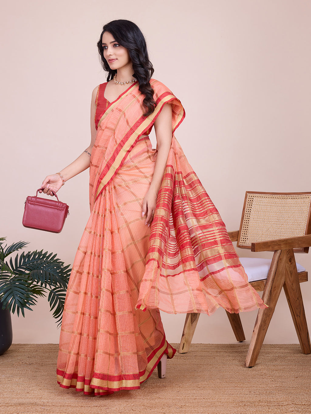 Peach kota doriya saree with zari weaving work