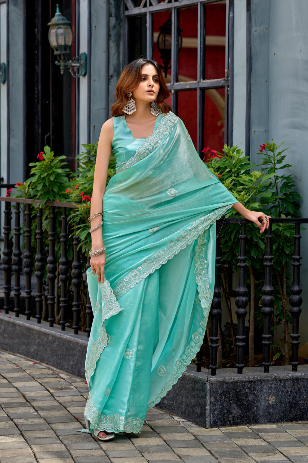 Sea green fancy shimmer chiffon saree with embroidery work