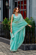Sea green fancy shimmer chiffon saree with embroidery work