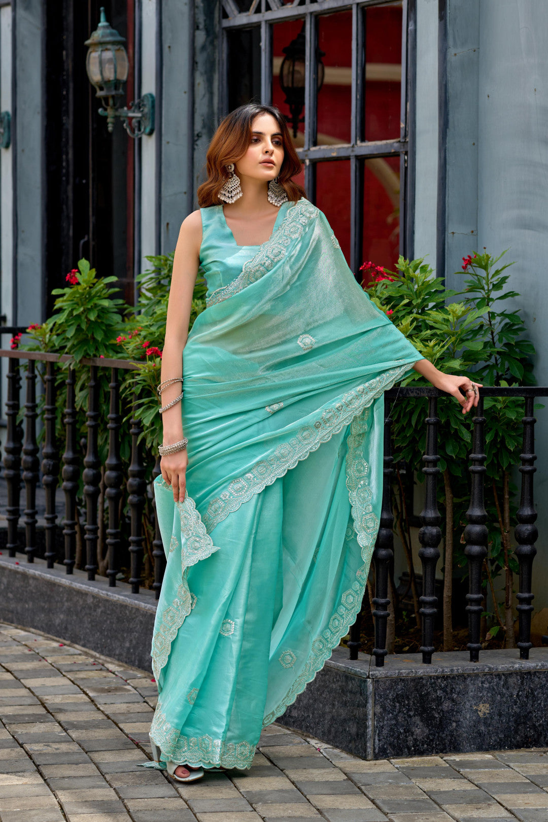 Sea green fancy shimmer chiffon saree with embroidery work