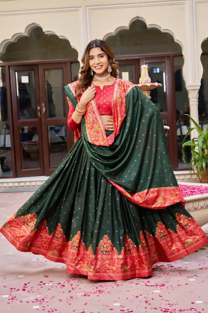 Green and red color dola silk lehenga with patola printed work
