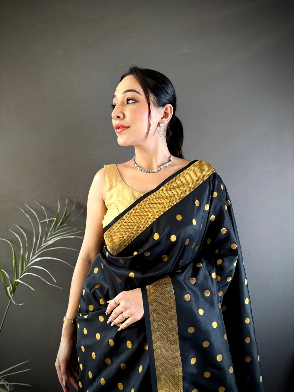 Black traditional paithani silk saree with zari weaving work