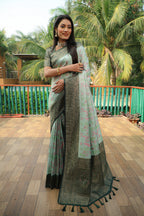 Sea green color kanjivaram silk saree with zari weaving work