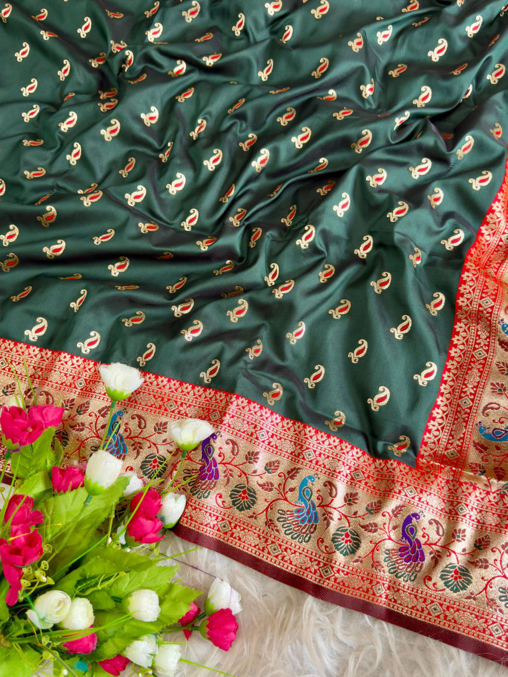 Green traditional paithani silk saree with peacock zari weaving work