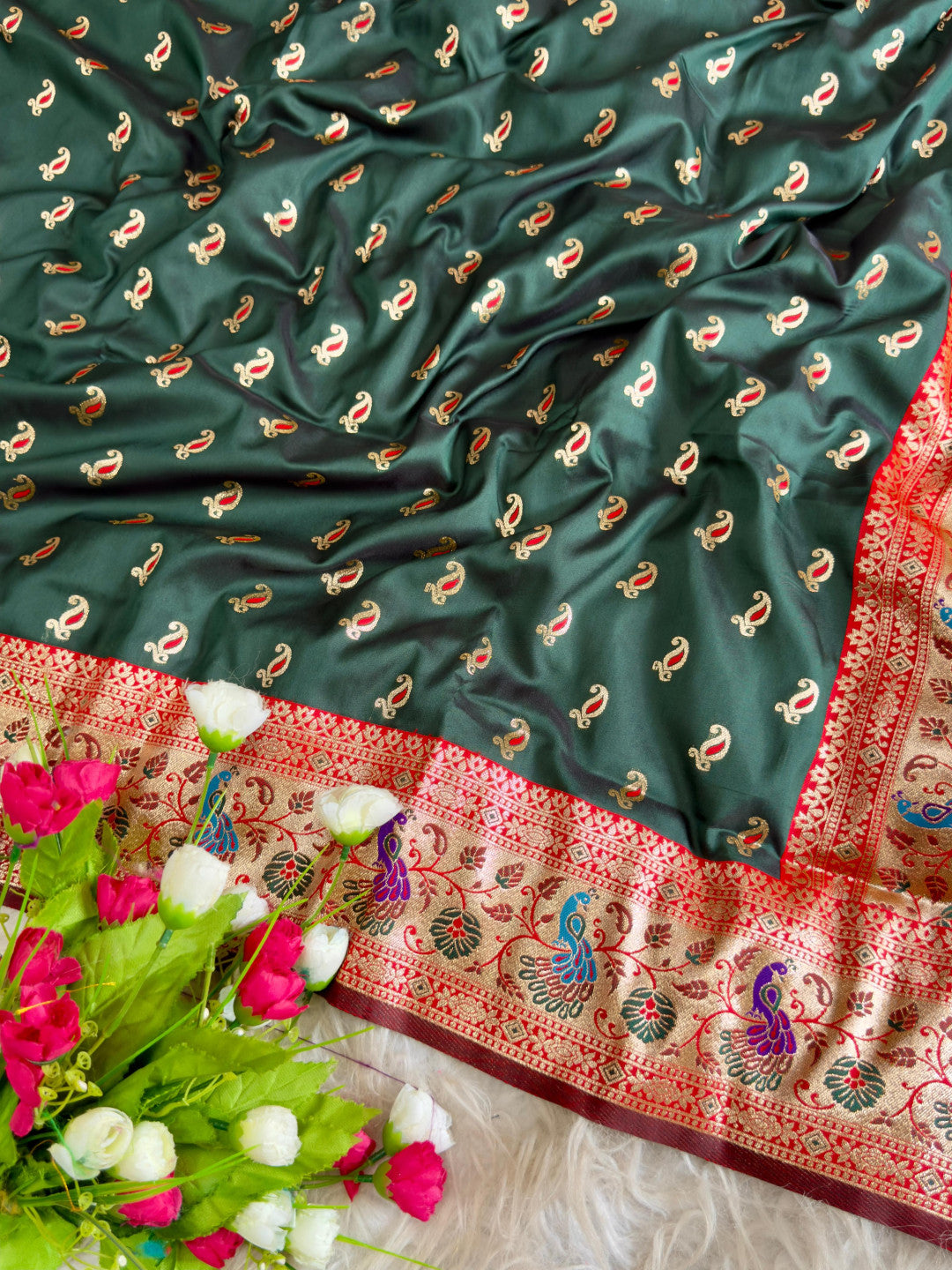 Green traditional paithani silk saree with peacock zari weaving work