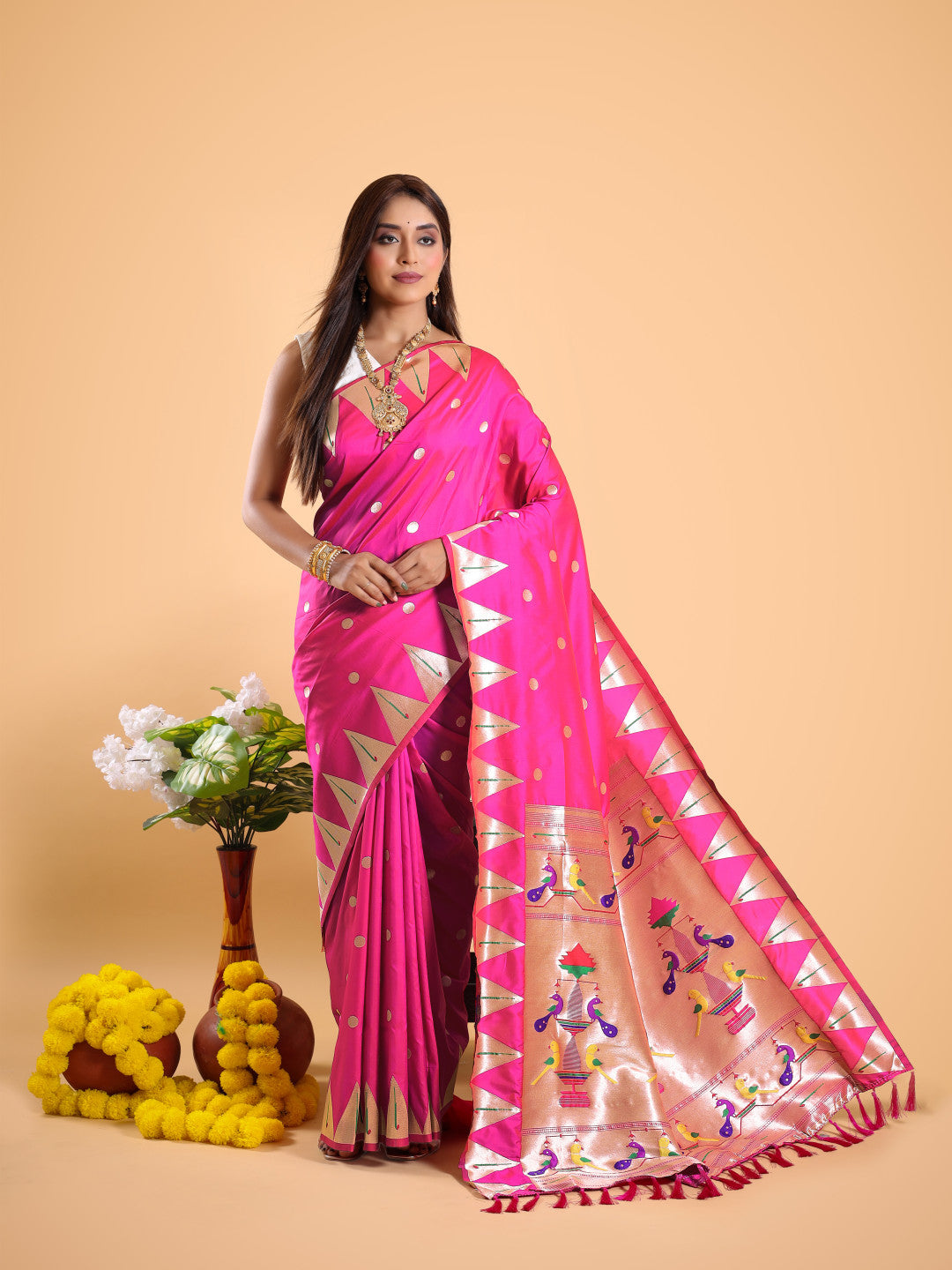 Rani pink color paithani silk saree with zari weaving work