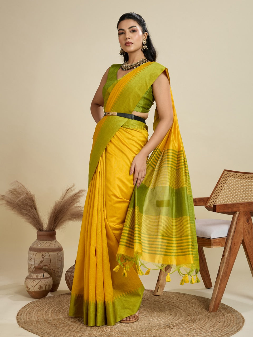 Yellow color khadi raw silk saree with zari lining pallu with tample border